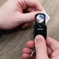מחזיק מפחות זכוכית מגדלת קומפקטית CARSON GN-70